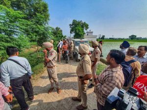 amritsar-punjab-police-personnel-at-the-site-of-an-encounter-in-which-two-gangs-